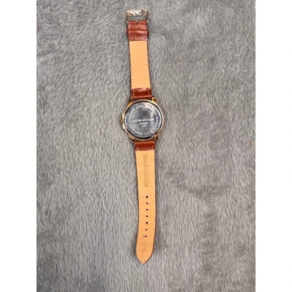 Accutime Watch Corp Stainless Steel‎ Caseback Gold Tone Black Face